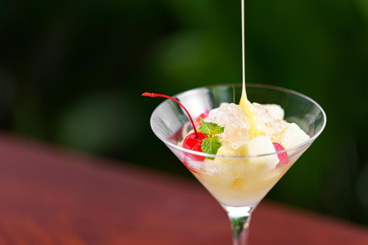 Shintana Saya La Maison Siem Reap Exterior foto A dessert being drizzled with crème anglaise